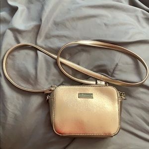 Small rose gold bag.